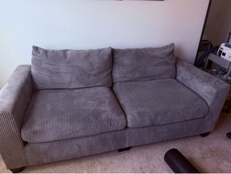 Living spaces corduroy grey / green loveseat