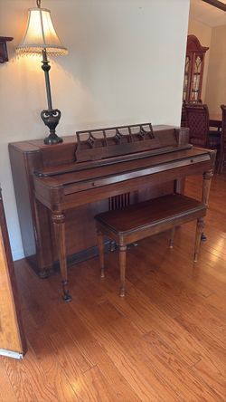 Wurlitzer upright piano with storage stool