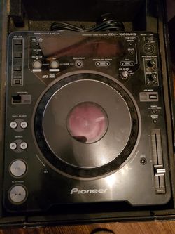 Pioneer CDJ-1000 MK3 and a Behringer DJX750 mixer