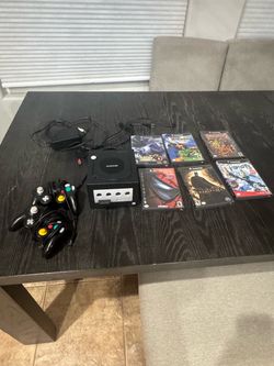 Black GameCube(Tested and working comes with all the power cords)