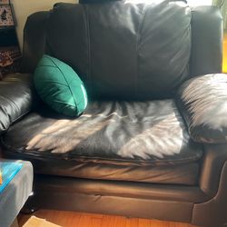 Giant brown leather chair.
