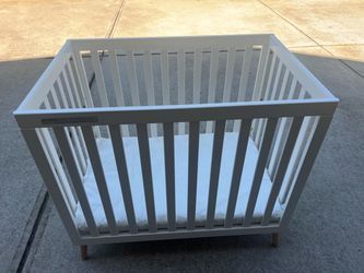 Modern White Mini Crib