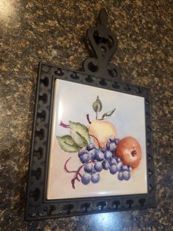 trivet fruit and pear black metal and porcelain