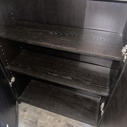 Used black wood shelf with cabinet books , display