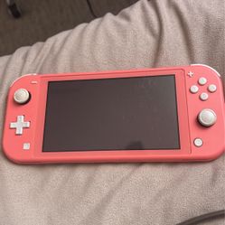 Nintendo Switch Lite In Pink Comes With Animal Crossing 