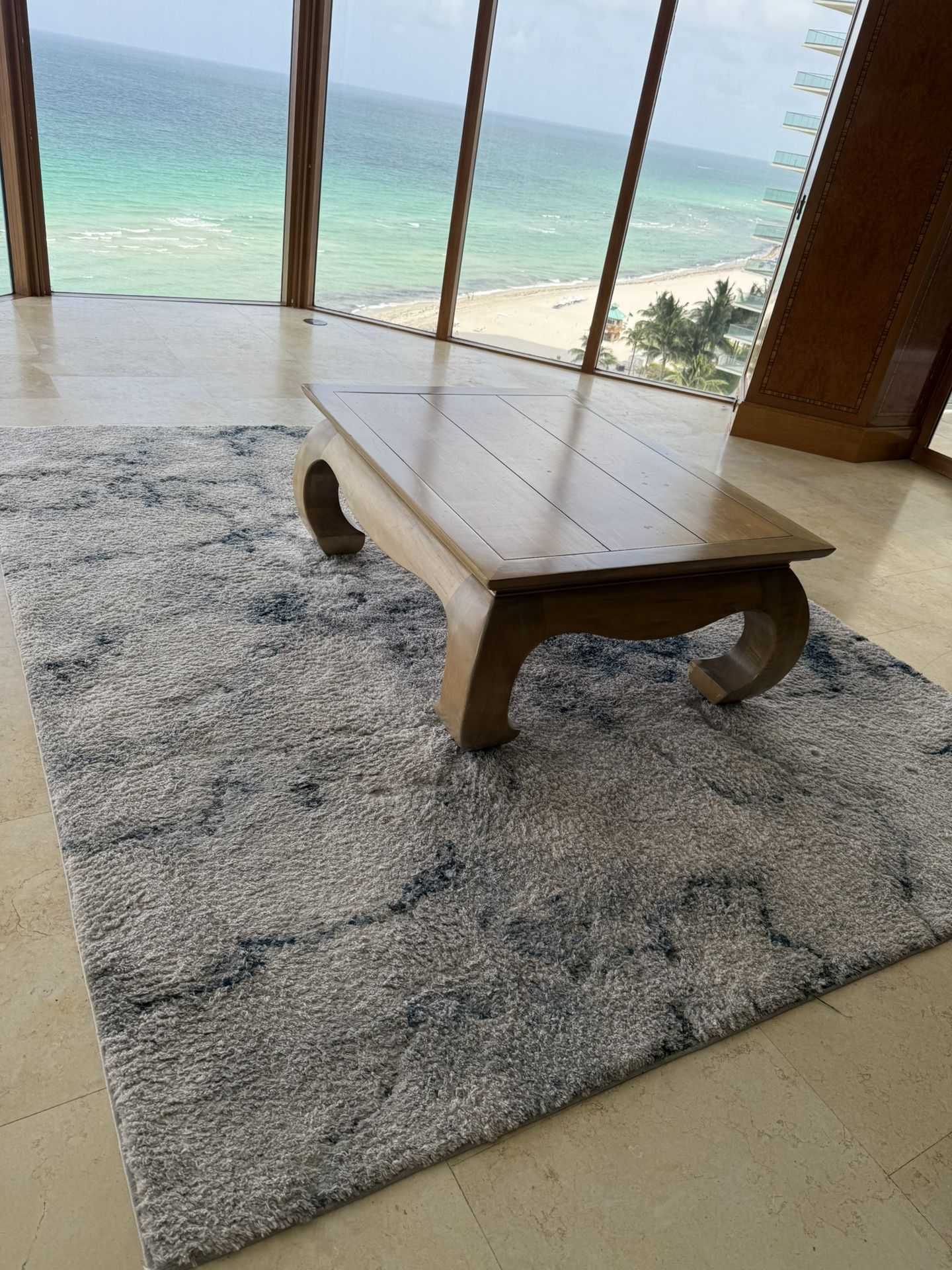 wood table and carpet asap