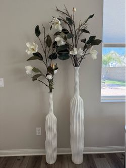 Tall white vases