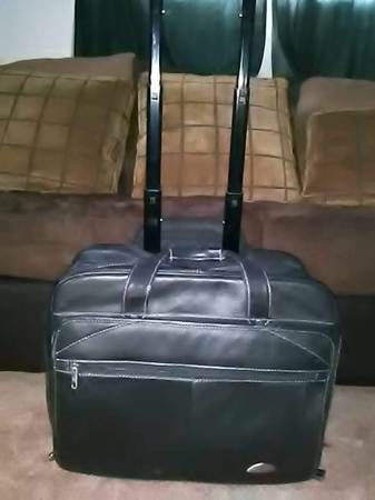 Vtg.Samsonite leather briefcase on wheels* pull out handle*great shape - $75