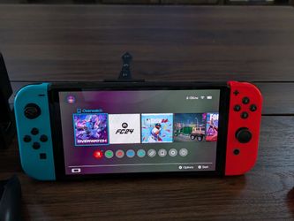 Nintend Switch with games and controllers