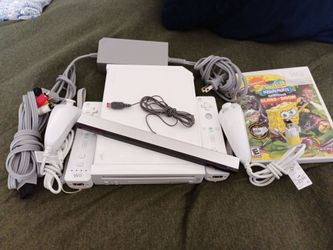 Wii with 2 Wii Remotes and Nunchucks + Game Bundle
