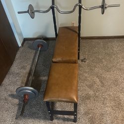 Bench, barbell, and hand weights