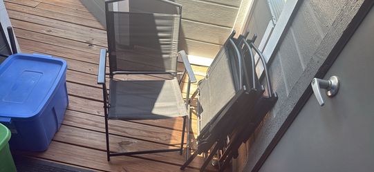 Outdoor glass top table and 4 chairs