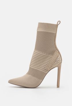 STEVE MADDEN DILIGENT HIGH HEELED ANKLE BOOTS 