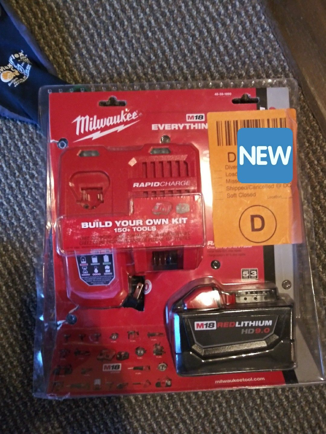 Milwaukee 9.0 aH battery and charger (obo)