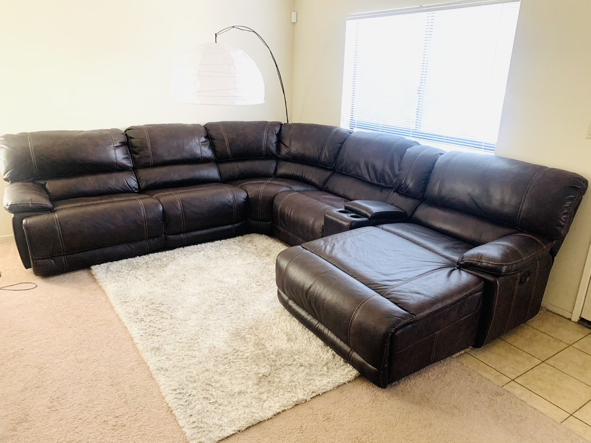 Like new leather sectional dual recliner with USB charging. $1050 Firm.