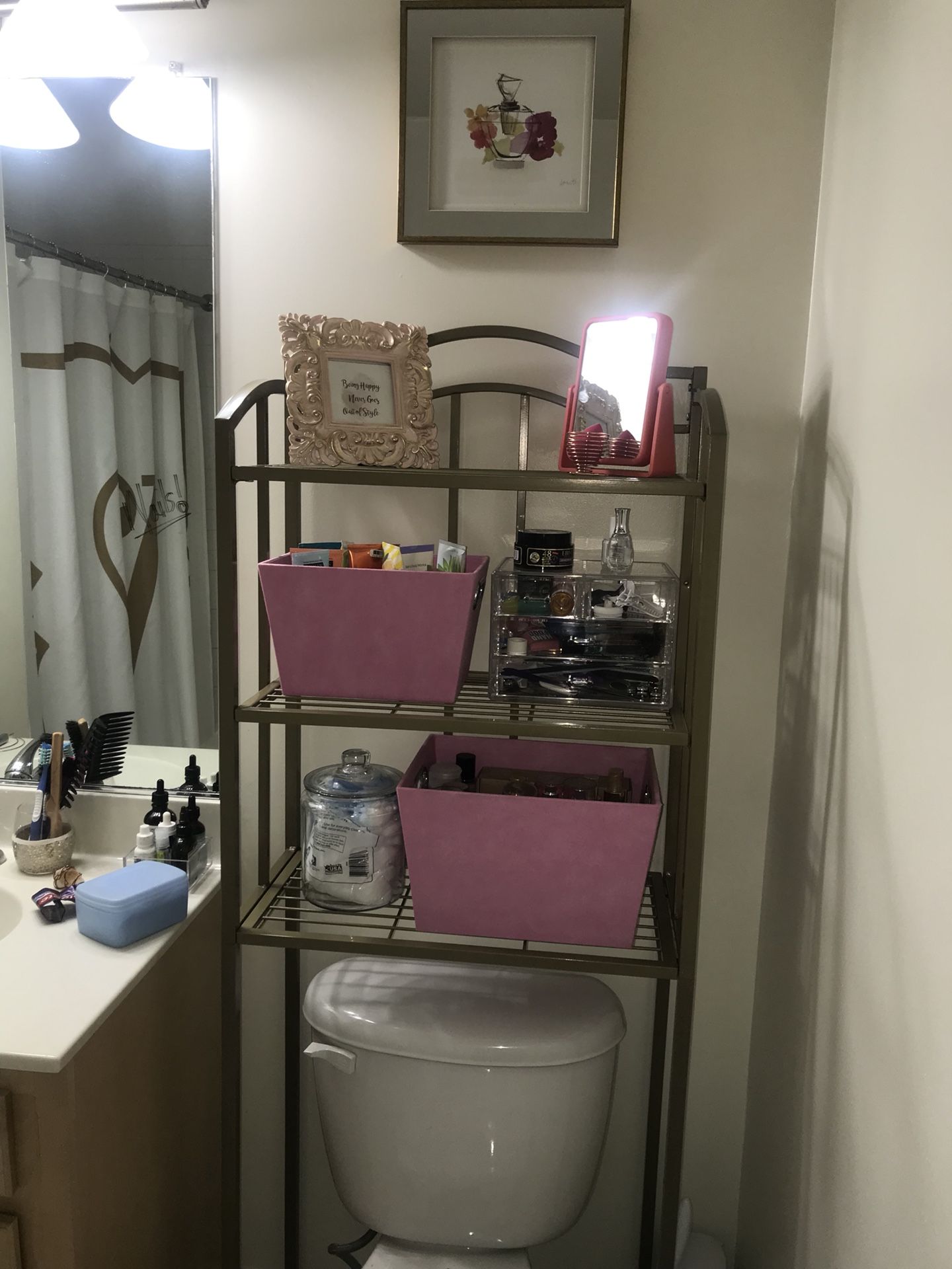 GOLD BATHROOM STORAGE UNIT WITH LARGE SHELVES