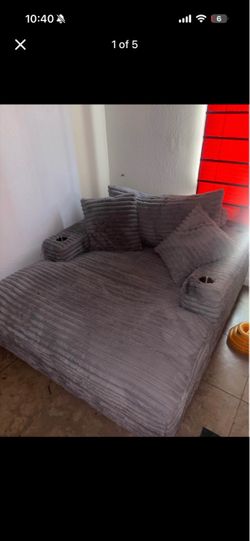 Plush corduroy bed couch with charger and cup holders