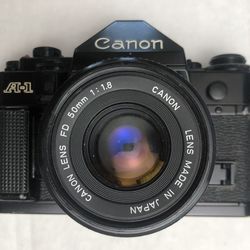 Canon A-1  Film Tested Camera with 50mm F1.8 Very Good Recently Serviced.