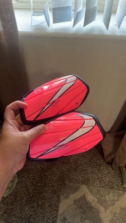 Pink Nike shin guards