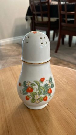 Vintage salt shaker by Avon. Made in Brazil and 22oz gold rim