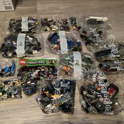 18 Unopened Sealed  Lego Bags. 1 Book 