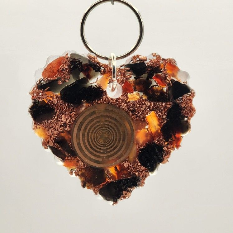 Love Keychain/Pocket Orgonite, Provides EMF Protection, and Empowerment
Dimensions:
Weighs 2.2 oz
High 2.4 in.
Wide 2.4 in.
Thick 0.4
Materi
