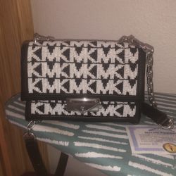 Authentic Numbered Micheal Kors Purse