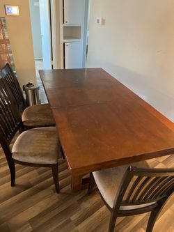 Used table with 3 chairs.
