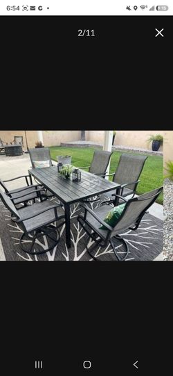 7 piece cast aluminum 59x35like new condition patio dining table and chair set $350