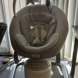 Graco Baby Swing with Music & Motion