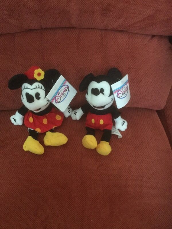 Mickey and Minnie dressed as in the 30's