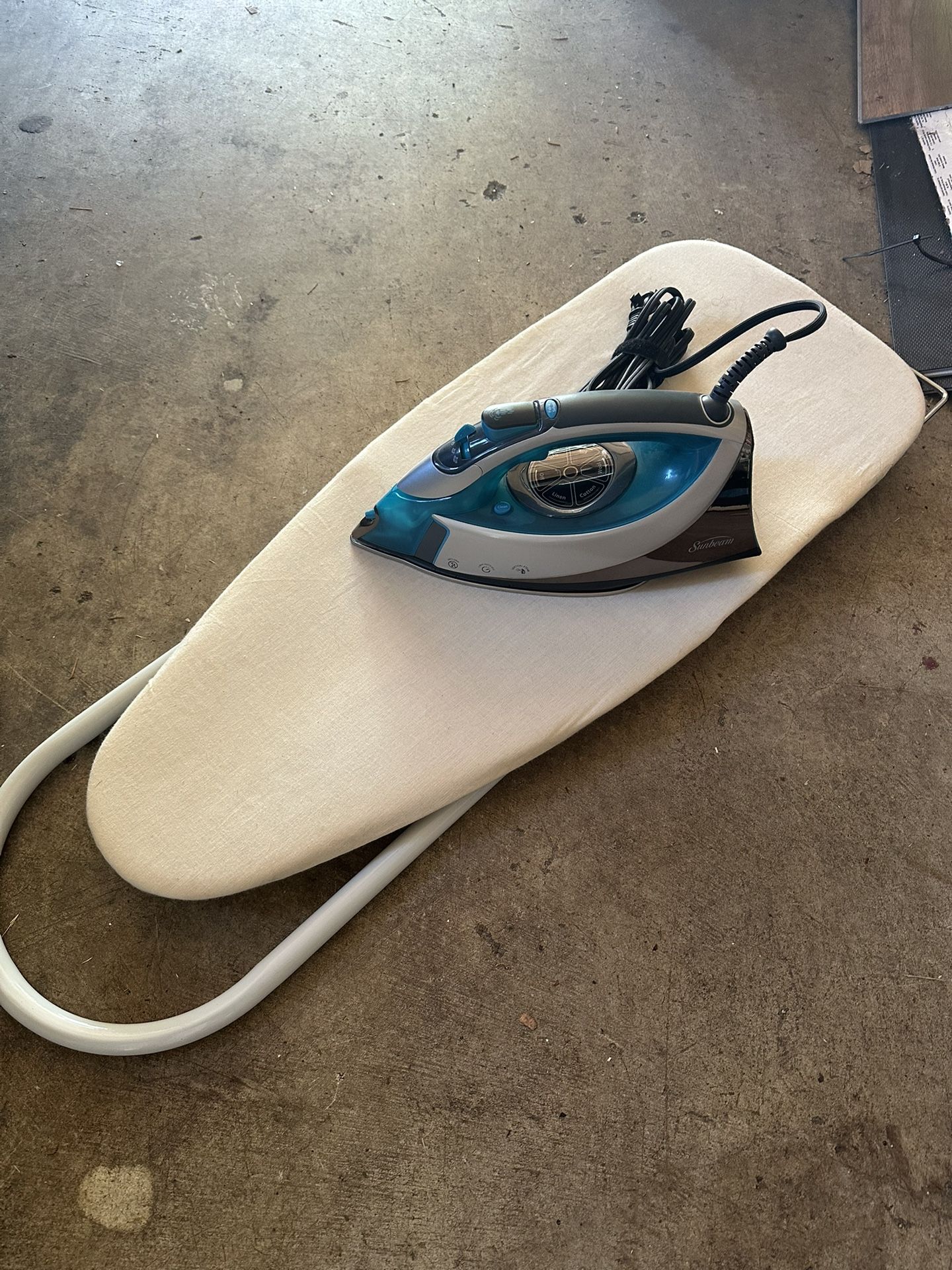 Compact ironing board and iron