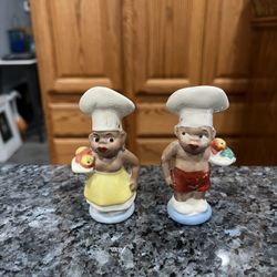 Vintage Ceramic Chef pair of salt and pepper shakers.  Size approximately 3 inches tall.  Preowned used normal wear with cork stoppers.  Has been on d