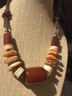 One of a kind necklace oyster shell bone and dark amber bead on copper