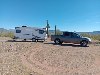 2009 Nissan Titan Truck and 2013 Skyline Bobcat model 173 Travel Trailer