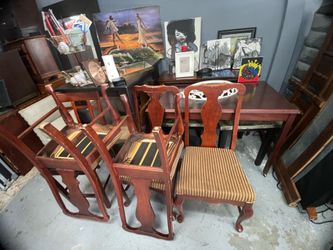 wood chairs and table set