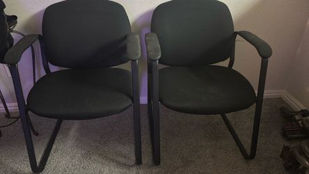 2 Black office chairs