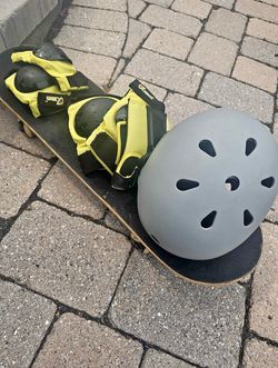 Skateboard with helmet and protections