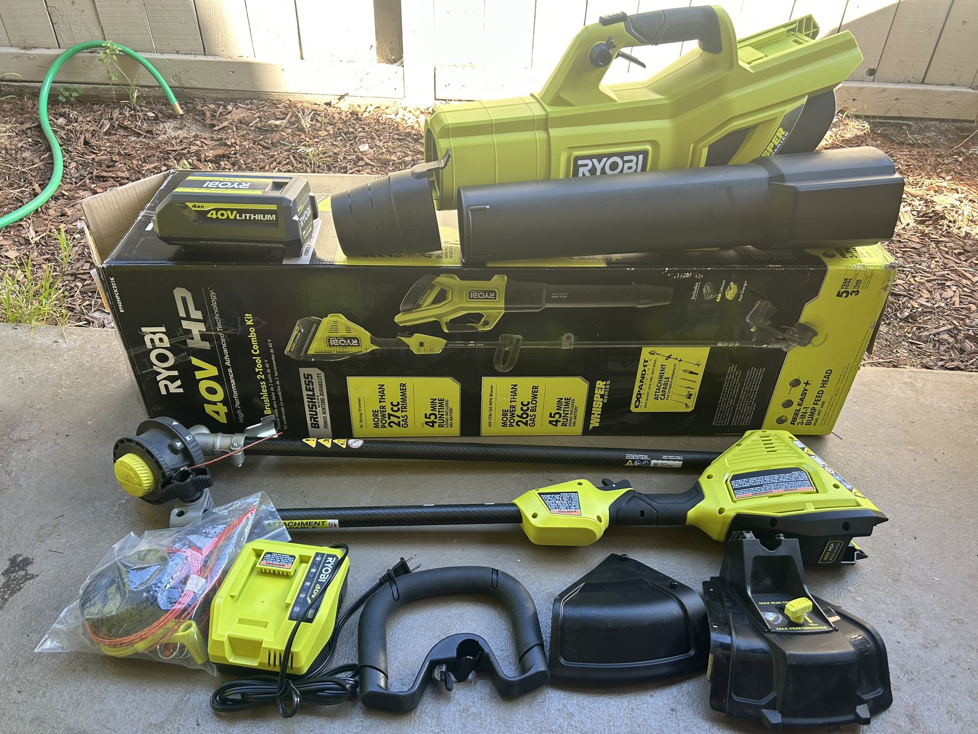 RYOBI 40V HP Brushless 650 CFM 160 MPH Cordless Leaf Blower and Carbon Fiber String Trimmer with 4Ah Battery and Charger