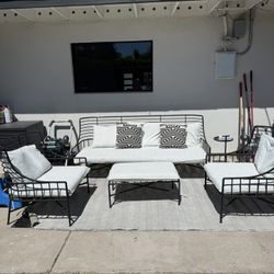 CB2 Breton 83” Black gMetal Outdoor Sofa + Chairs with Outdoor Covers