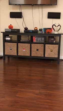 TV stand with baskets