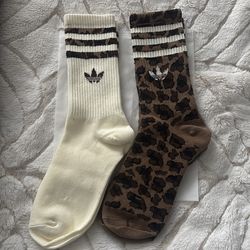 Adidas unisex, leopard crew socks, size medium brand new never worn