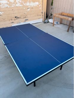 JOOLA table tennis set. Complete with net, racquet and balls.