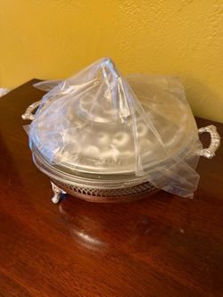 Vintage Pyrex oven bake dish on decorative holder