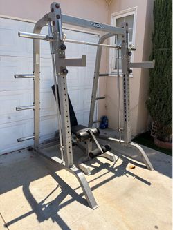 Tuff stuff smith machine in good condition comes with adjustable bench same brand  j hooks and safety bars  pick up in sun valley cash only