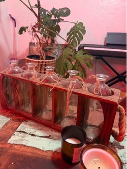 Rustic cute glass bottles in wood