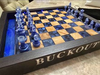 Custom made chess board & chess pieces.