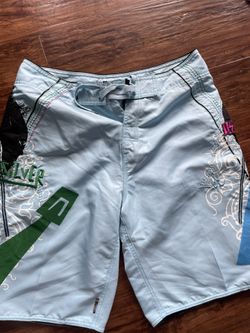 Like new quicksilver shorts size 31 long 20$