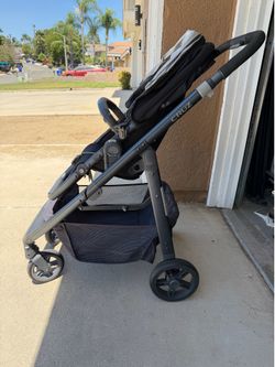Uppababy Cruz Stroller and Travel Bag