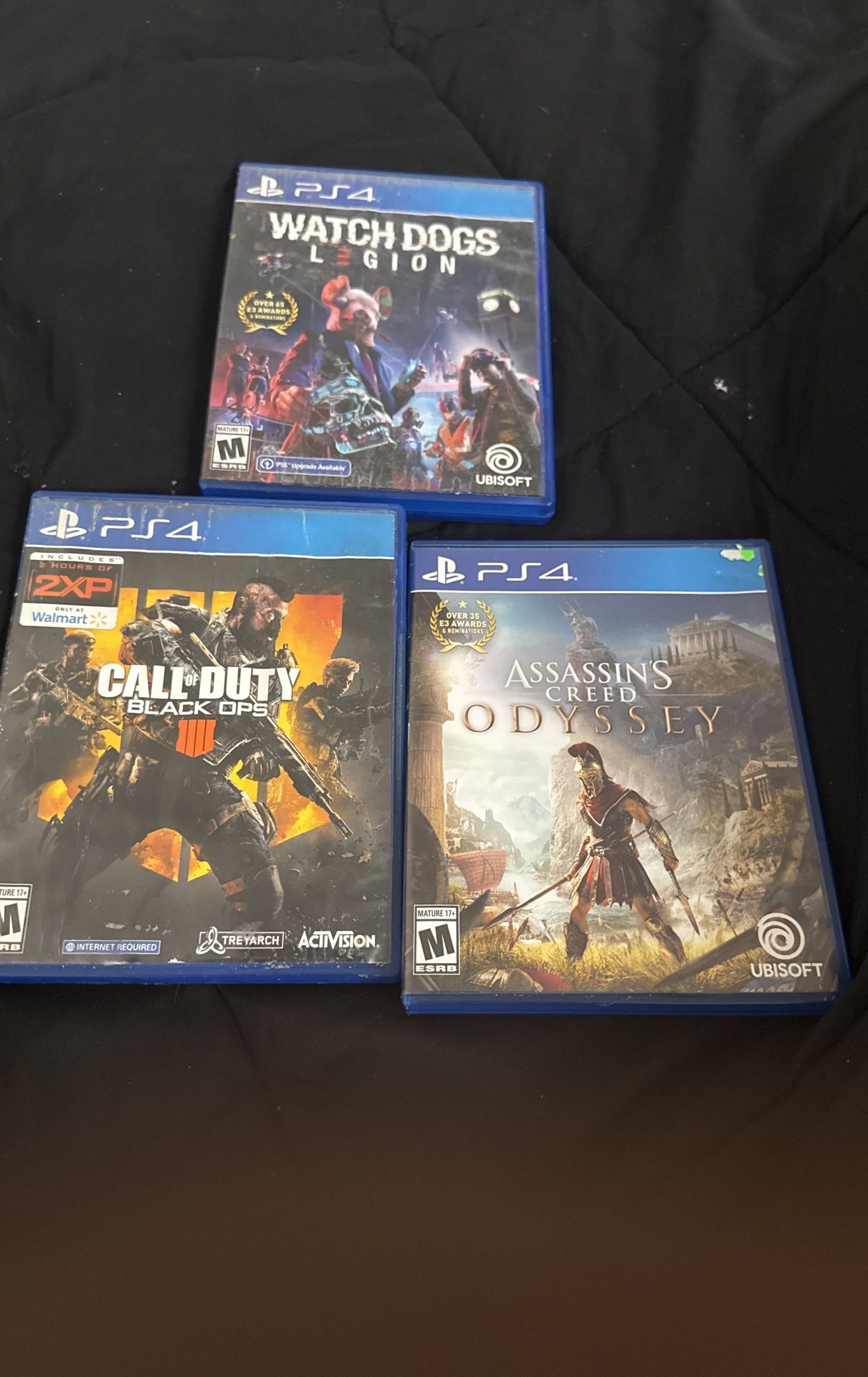 Three Video Games For Sale Watch Dogs, Legend Call Of Duty Blackouts Assassin Creed Oddisee